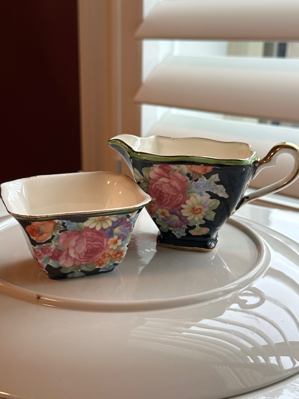Black And Pink Floral Cream and Sugar Set. (Possibly Royal Winton)